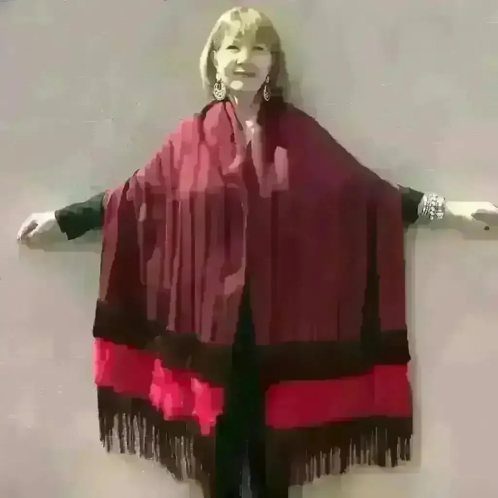 Purepecha rebozo with fringe and feathers